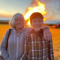 Beacon behind two people