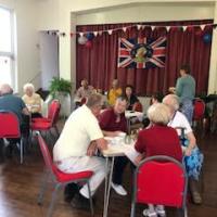 People sitting having tea