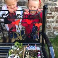 Children dressing the well