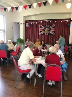 People sitting having tea