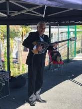 Man playing stringed instrument